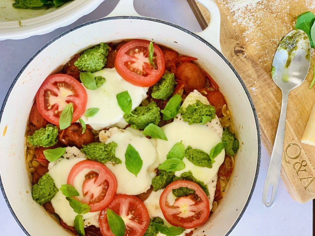 Photo of one pot caprese chicken orzo on dutch oven le creuset