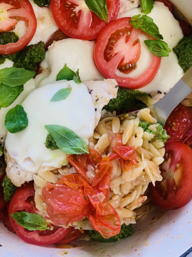 photo of one pot caprese chicken orzo basil mozerella