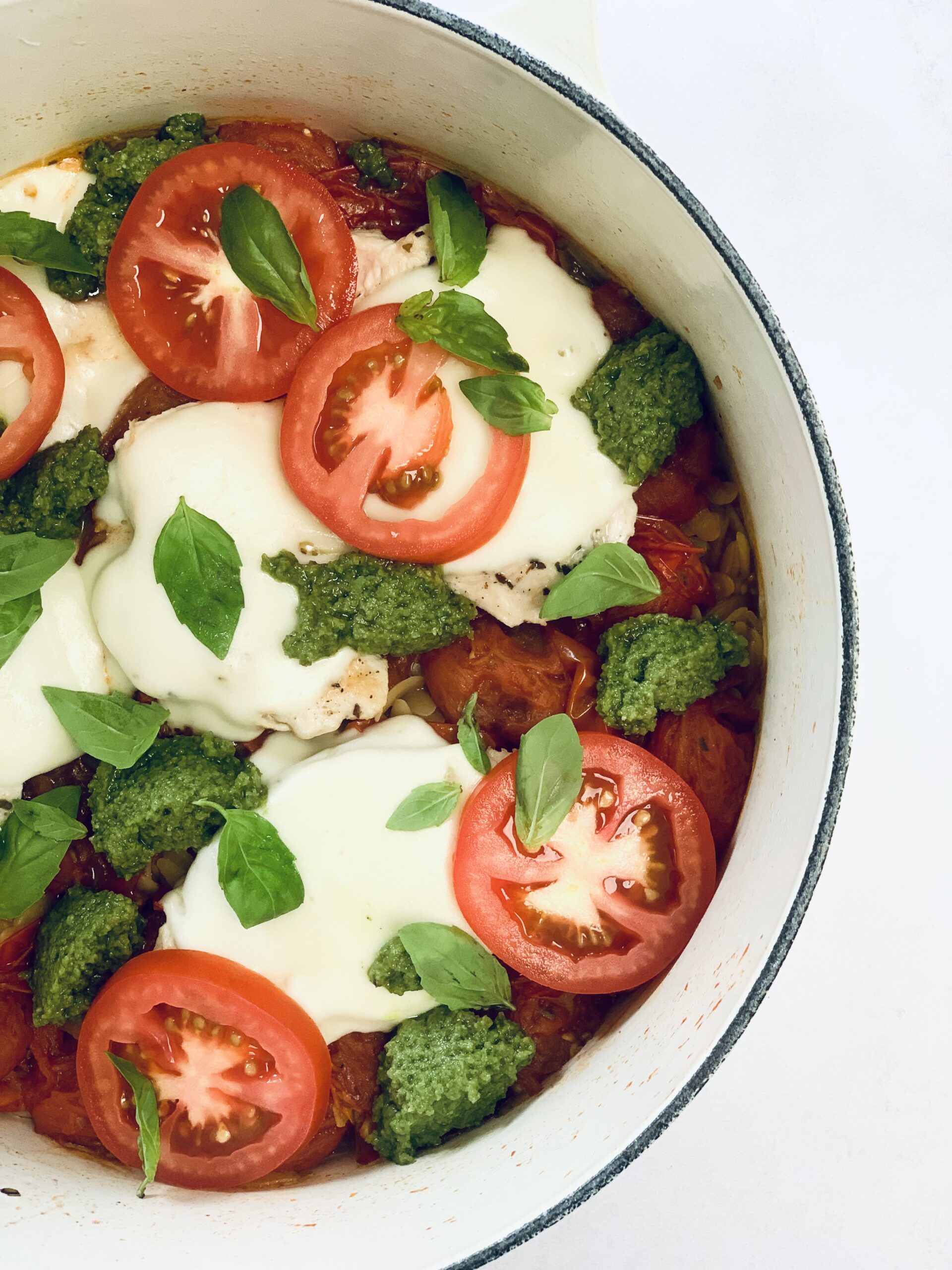 Photo of fresh tomatoes, basil and mozzarella chicken orzo le creuset